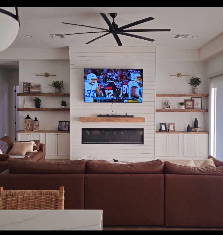 Black diagonal shiplap TV accent wall with blue flame fireplace Arizona