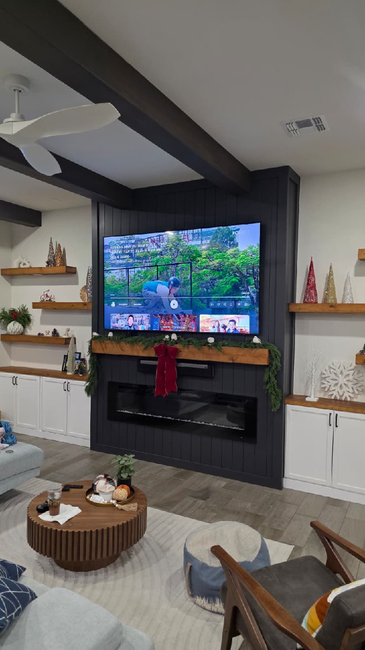 Full room dark shiplap entertainment wall with Christmas decor Arizona