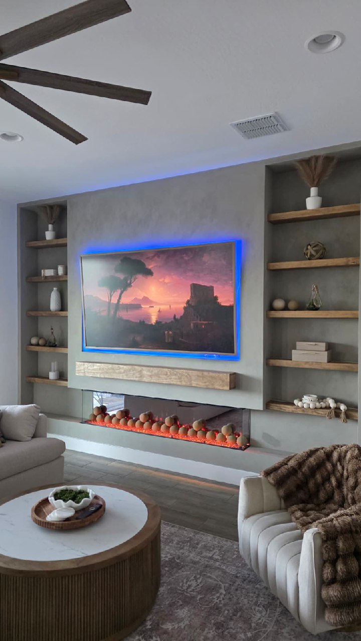 Samsung Frame TV on entertainment wall with fireplace and blue LED backlighting Arizona