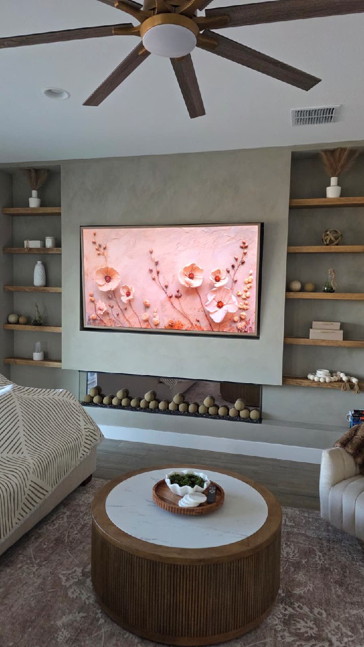 Frame TV displaying floral art on custom entertainment wall Arizona