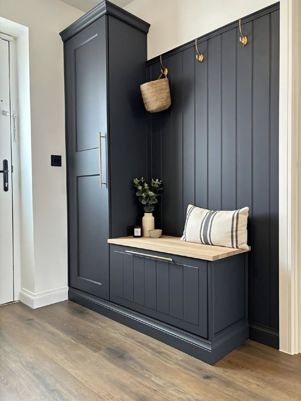 Light grey epoxy garage floor with wall mounted storage system Arizona