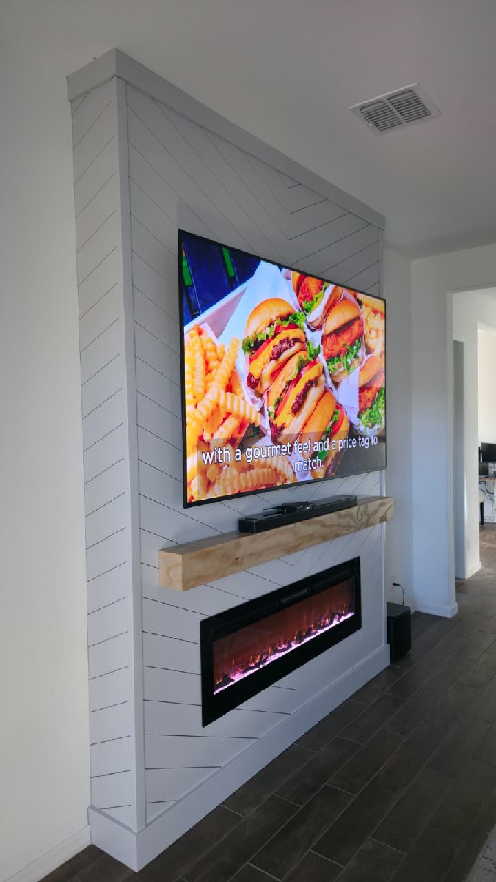 White shiplap kitchen island end panel with wood bar top and barstools Arizona