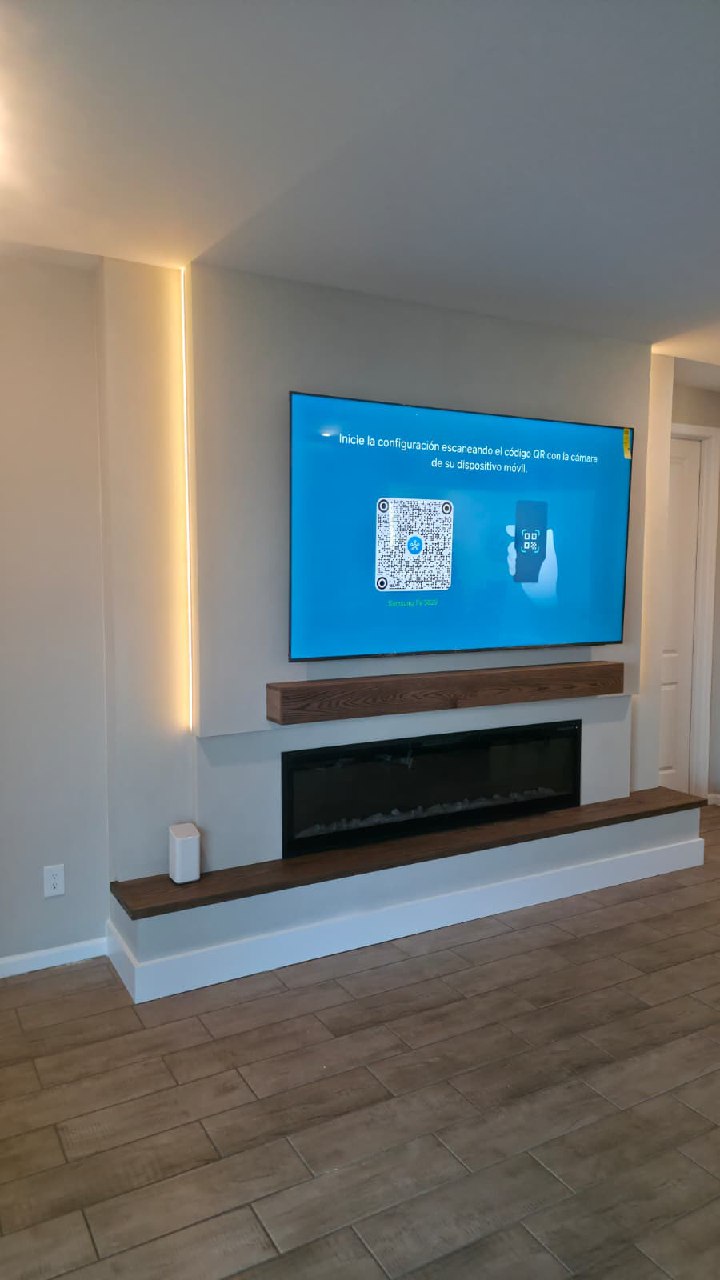 Modern minimal TV feature wall with warm LED strip and linear fireplace Arizona