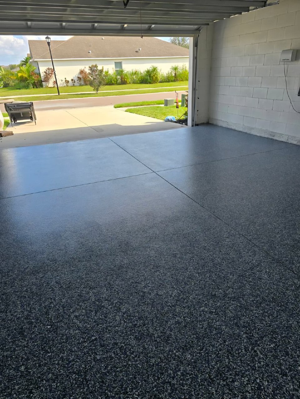 Natural wood slat mudroom wall with white storage cabinets and bench Arizona