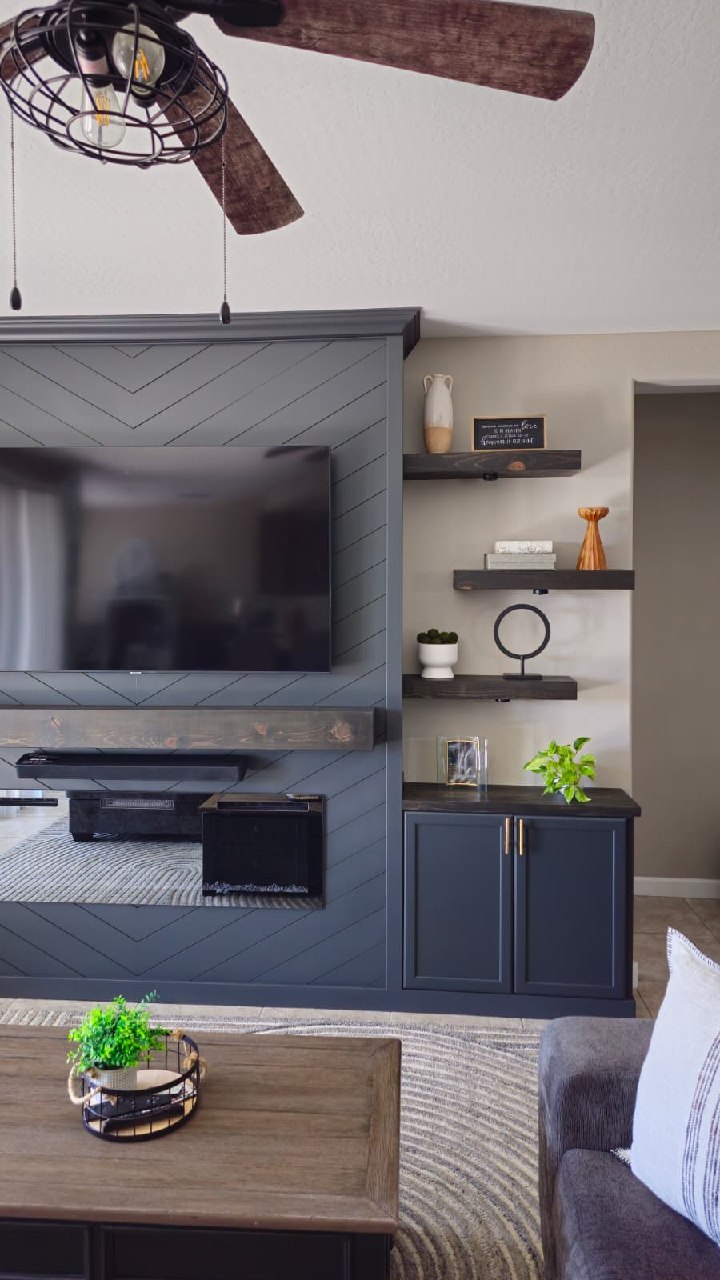 Steel grey chevron entertainment wall full room with ceiling fan and sectional sofa Arizona