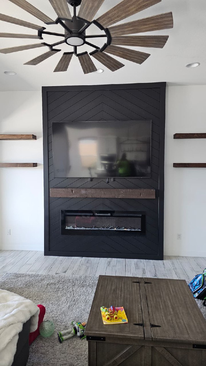 Stone ledger tile TV wall with orange LED fireplace alternate angle Arizona