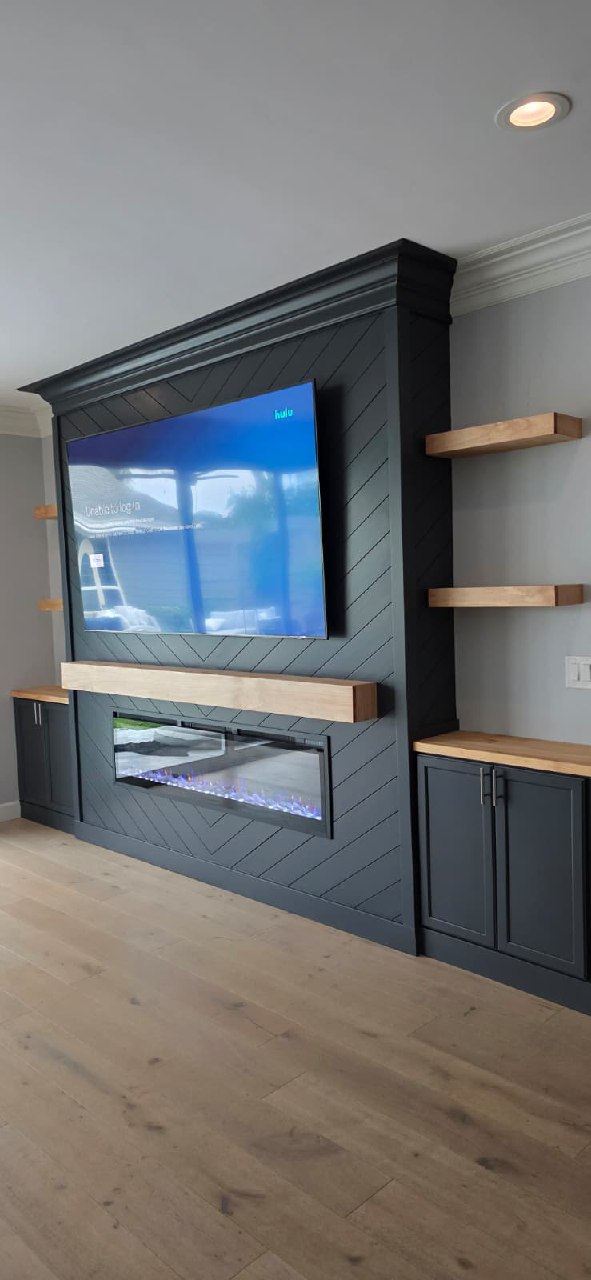 Venetian plaster TV wall close-up with purple flame electric fireplace Arizona