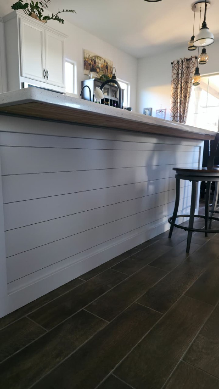White chevron shiplap entertainment wall with electric fireplace front view Arizona