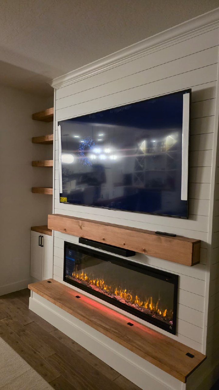 White shiplap wall with linear fireplace and red LED accent lighting Arizona
